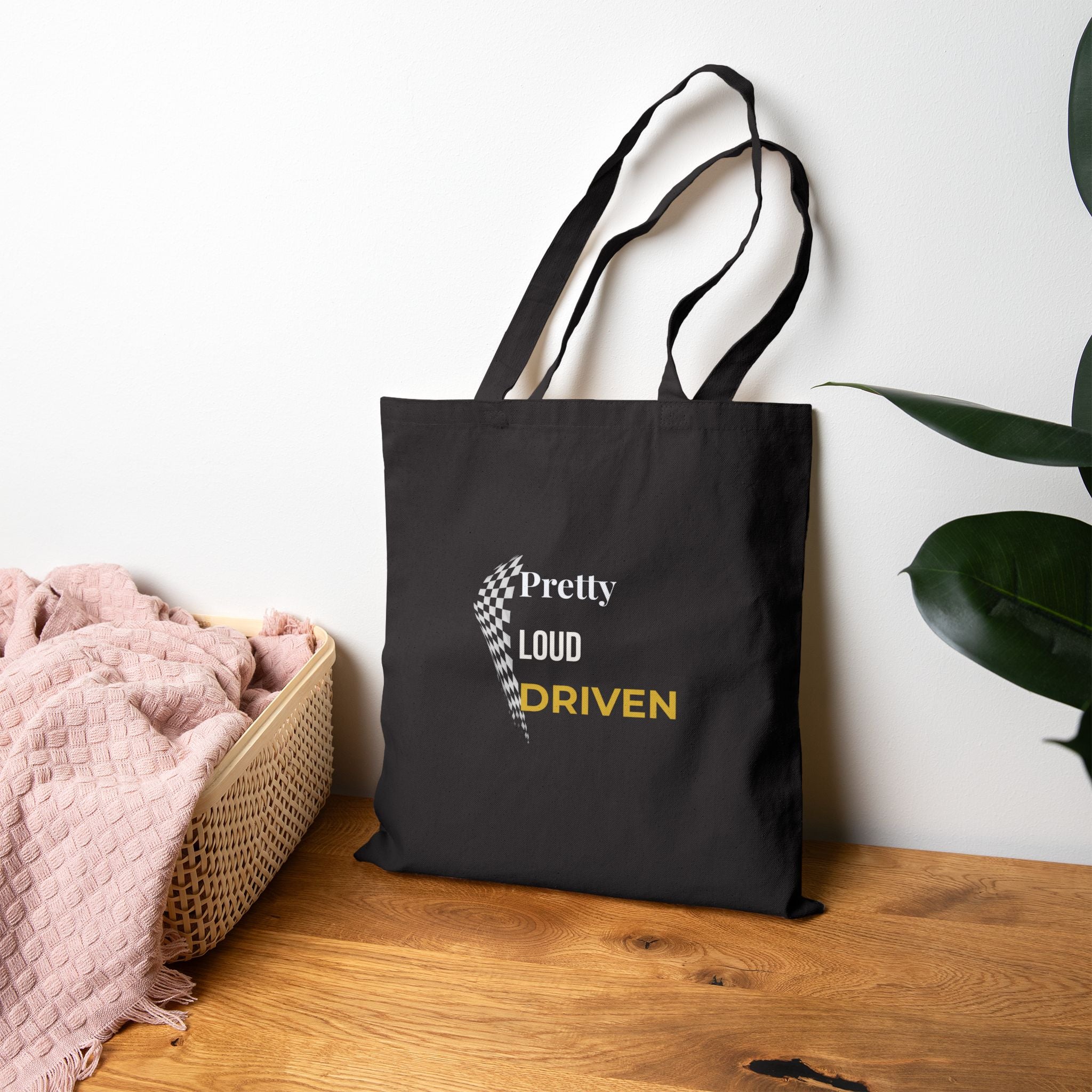 Pretty Loud Driven™ Tote Bag – Racing Flag Graphic Tote – Feminine Motorsport Streetwear – Empowered Women’s Tote Bag
